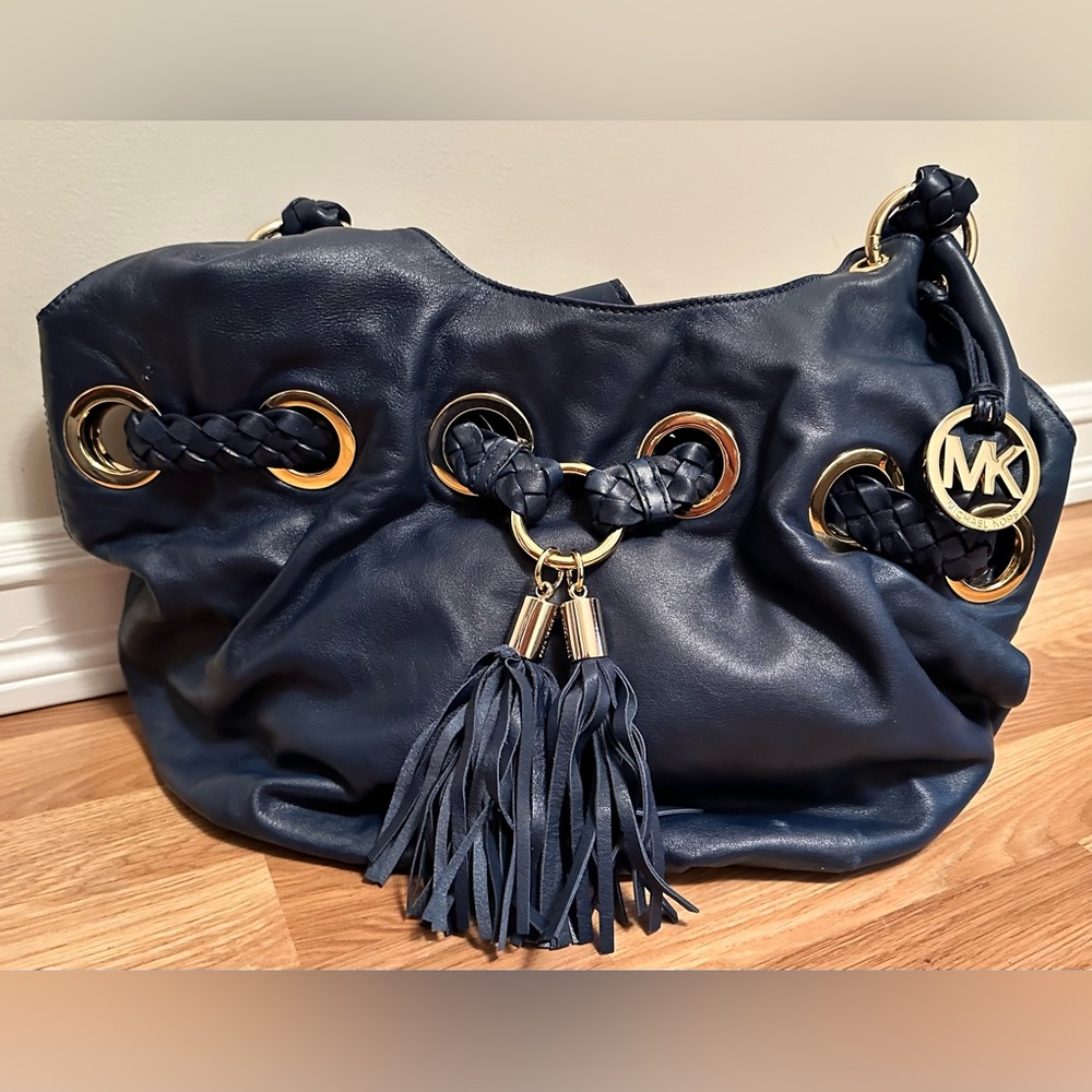 Authentic Michael Kors navy leather bag, excellent condition.